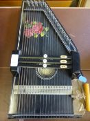 A Black Painted Vintage Auto Harp.