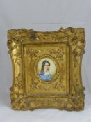 A Circa 1830 Hand Painted on Ivory Oval Miniature Portrait, depicting a young lady, the young lady