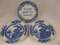 Three blue and white Delft plates, two in the Chinese style and the other having the wording "" It