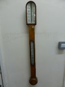 Antique stick barometer by Leech, Chelmsford, the barometer set in a burr maple case, approx.