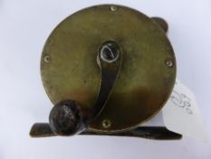 A vintage brass fly fishing reel, engraved Chas. Farlow Maker 191 Strand, London together with a