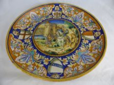 An Italian Earthenware Maiolica Charger possibly Ulysse Cantagalli, painted with a central