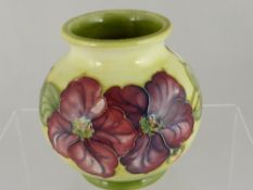 Moorcroft Vase, with Clematis design on yellow ground. Painted signature to base together with