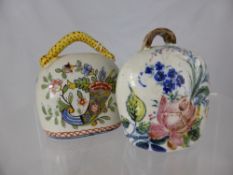 Two Antique Ceramic Decorative Cowbells hand painted with flowers.