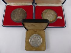 A hallmarked silver Jubilee medal in the original box together with a hallmarked silver medal in