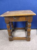 Antique oak stool  having bobbin style legs, approx. 44 x 27 x 48 cms.