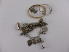 Solid Silver Charm Bracelet, with fourteen charms together with a loose charm, silver ring, oak