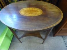 Victorian inlaid oval occasional table having a central cartouche to the top depicting a shell, the