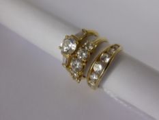 Two 9ct Yellow Gold White Stone Rings, Size N (solitaire)  and O on the graduated white stone ring