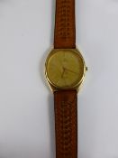 A Vintage Gentleman`s Quartz Omega wrist watch, with leather strap.