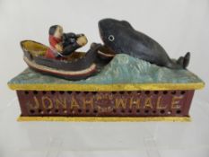 Shepard Hardware & Co., Cast Iron Mechanical Money box and coin throw in the form of Jonah and the