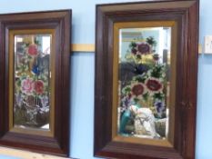 Two Victorian mahogany framed reverse painted mirrors depicting swallow amongst flower sprays,