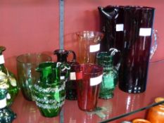 Eleven pieces of assorted coloured glass incl. jugs, glasses, vases etc.