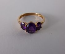 Lady`s 9ct Rose Gold Three Stone Amethyst colour Ring, size N, approx 2.1 gms