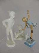 Two Blanc de Chin Porcelain Figures, depicting a Boy Skater and a boy with his pet, together with a