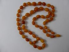 Set of Vintage Amber Beads, approx 40 cms, graduated from 0.8 to 1.5 cms, approx 42 gms.
