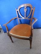 Hepplewhite style shield back armchair, the back having decorative inlay on tapered front legs and