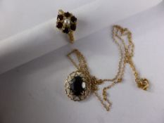 Lady`s 9ct gold garnet and seed pearl ring, size L, together with a 9ct gold garnet on a chain,