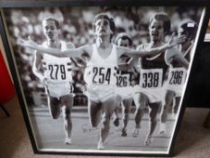 Large photographic image of Sebastian Coe winning a road race, signed Sebastian Coe, dated 26th Jan