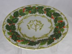 A Copeland Spode Charger depicting mistletoe and holly, impressed crown to base, together with a