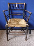 Morris & Co.  ""Sussex"" elbow chair attributed to Ford Madox Brown, circa 1864 / 5, the chair