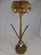 An Arabic Gilded Decorative Palm Tree, with crossed swords at the base, and Arabic italics to the