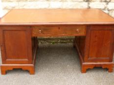 Victorian oak and mahogany partner`s desk having a single drawer to the front, each pedestal having