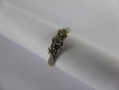 Lady`s 18ct and Platinum three stone diamond ring, Size K, 2.3gms