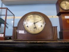 An Oak Cased Mantle Clock Art Deco in style.