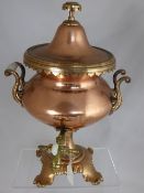 A Copper Samovar with a brass pourer and porcelain handles, approx 48 cms