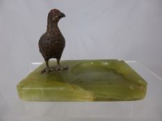 Two Green Onyx Ashtrays the first with a cold painted bronze partridge, the second ashtray depicts