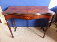 Victorian scalloped edge mahogany card table, the folding top having inset green baize, the table