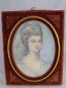 A Miniature Portrait by Lilian Palmer depicting a beautiful lady in velvet lined frame 21 x 15 cms.