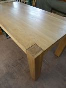 A large Chinese oak dining table on square sturdy legs, the table being approx. 92 x 180 x 78 cms,