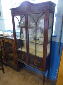 Edwardian glass fronted mahogany display cabinet having inlaid floral decoration and banding, on