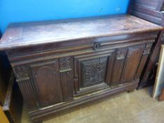 Late 18th century oak chest having lift top with carved cupboard front, approx. 122 x 52 x 80 cms.