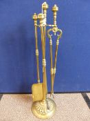 Vintage brass fireside companion set, one finial is missing.