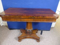 Regency rosewood open leaf hall table supported on a centre column on beaded base and reeded feet,