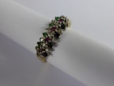 Lady`s 18ct yellow gold, three band ring, set with diamonds, emeralds, ruby and sapphire, Size O,