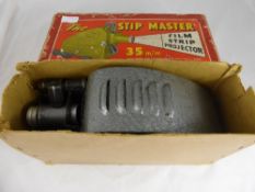Vintage StipMaster Film Projector in the original box 35 mm.
