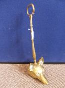 Vintage brass door stop, the base being in the form of a fox`s head.