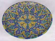 A 19th century Maiolica Earthenware Bowl possibly Persian with a cobalt yellow and green highly