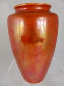 Ruskin orange lustre vase, impressed marks to base, approx. 20 cms.