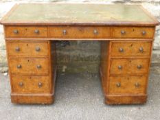 Victorian walnut twin pedestal desk having a leather top with three drawers to the front and four