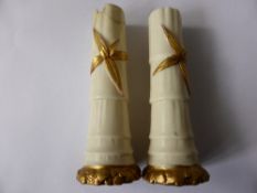 Pair of Royal Worcester spill vases, marked 1049 to base, floral gilt decoration on white ground,