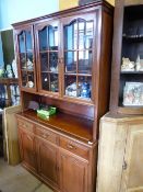 Oriental Fruitwood Display Cabinet, three glazed doors to the top, with an open display shelf