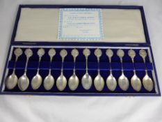 John Pinches Solid Silver, `Twelve Zodiac Spoons`, in the original box, together with a First Day