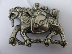 An Antique Chinese Figure of a Character riding on a mythological creature, character marks to