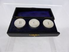 A set of solid silver holy oil stocks, London hallmarked, in their original box.