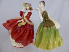 A Royal Doulton Figurine ""Top of the Hill"" H.N. 1834, together with a Royal Doulton Figure ""